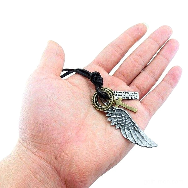 Alternative gothic angel wing pendant necklace on leather cord showing symbol engravings and vintage patina metal finish