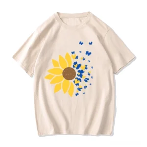Beige Oversized Sonnenblumen Grafik T-Shirt mit blauen dekorativen Elementen, Casual Goth Style, Frontansicht, Flat Lay Studio