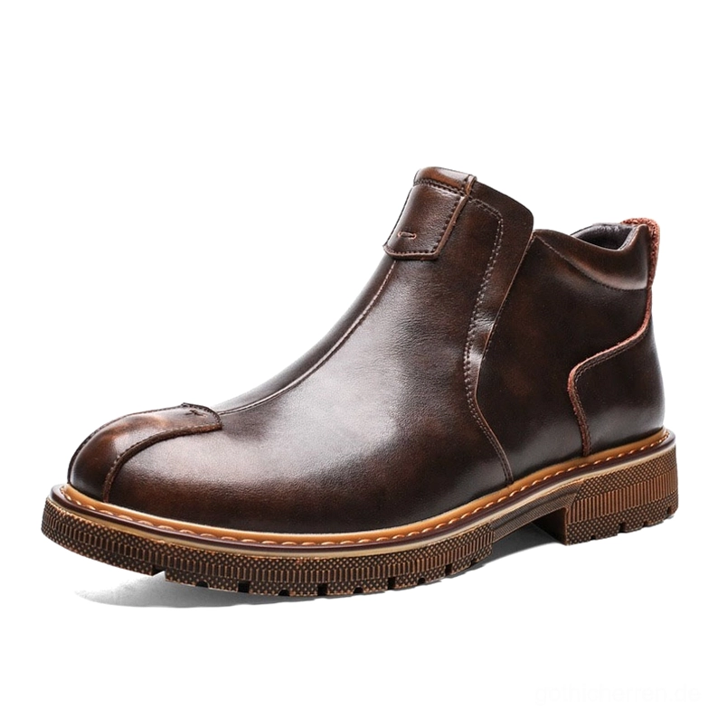 Braune retro Gothic Chelsea Stiefel für Herren mit glänzendem Leder und kontrastierender gestickte Sohle, rutschfeste Gummisohle, Knöchelhöhe Slip-on Design