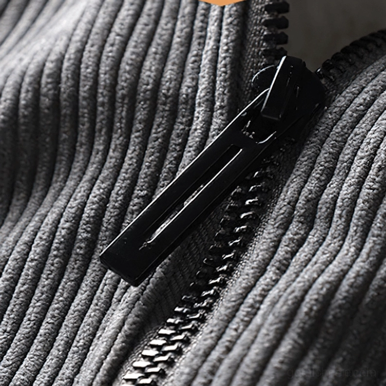 Cordsamtstoff Textur und gerippte Webart Nahaufnahme – Hochwertiges Polyester-Material der Dark Victorian Cordsamt Parka mit Struktur