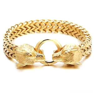 Goldenes poliertes Wolfskopf-Gothic-Armband mit doppeltem Wolfsverschluss und Gliederkette Overhead-Ansicht