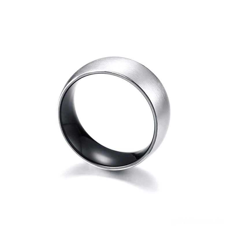 Draufsicht des mattschwarzen Edelstahl-Bandrings zeigt die gebürstete Silberaußenfläche und das polierte schwarze Innenband-Detail auf weißem Hintergrund mit klarer Geometrie