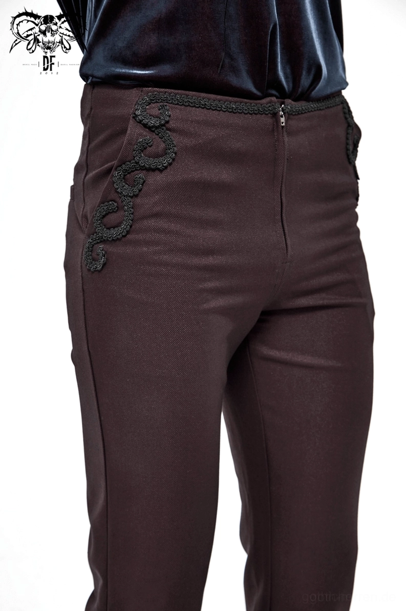 Detailansicht der semi-fitted Taillenband-Konstruktion mit Spitzenstickerei-Platzierung auf Herren-Gothic Röhrenhose