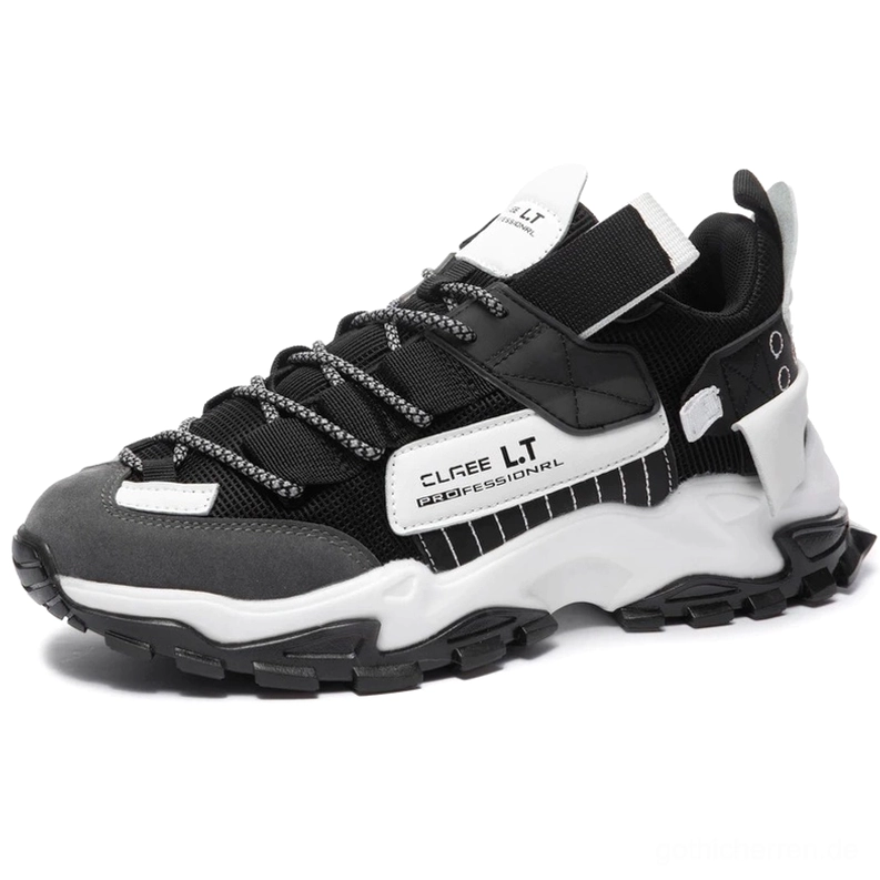 Gothic Lace-Up Turnschuhe Schwarzgrau-Weiß Seitenvorderansicht mit reflektierenden Schnürsenkeln und Markenmarkierungen Industrial-Ästhetik