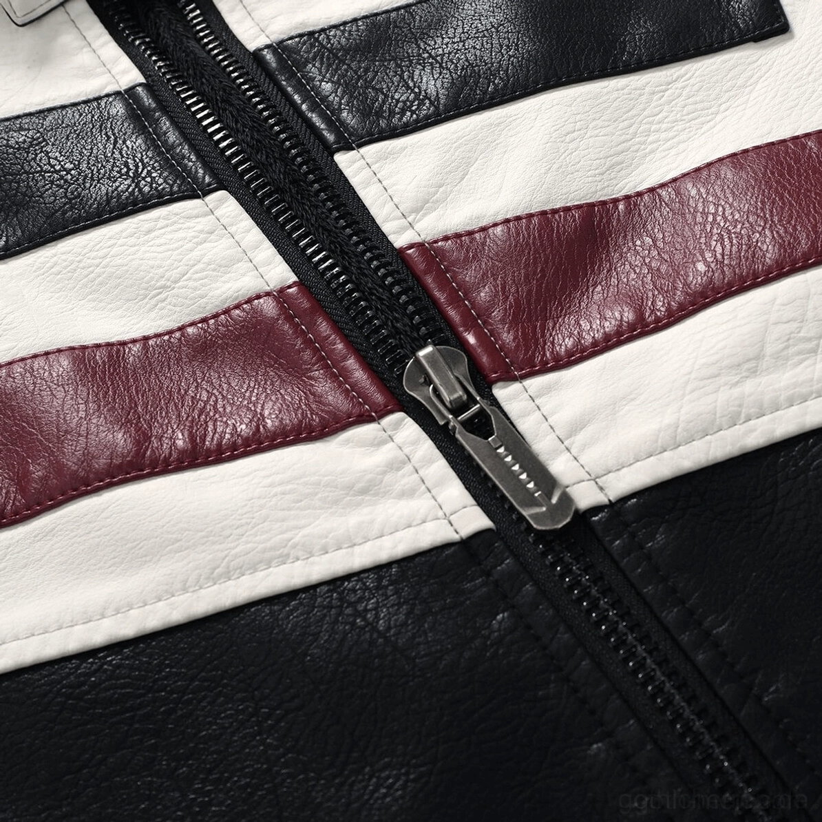 Nahaufnahme des Front-Reißverschlusses und Farbblock-Streifen-Details einer gothic Motorradjacke, zeigt Heavy-Duty Metallhardware und strukturierte PU-Leder-Oberfläche