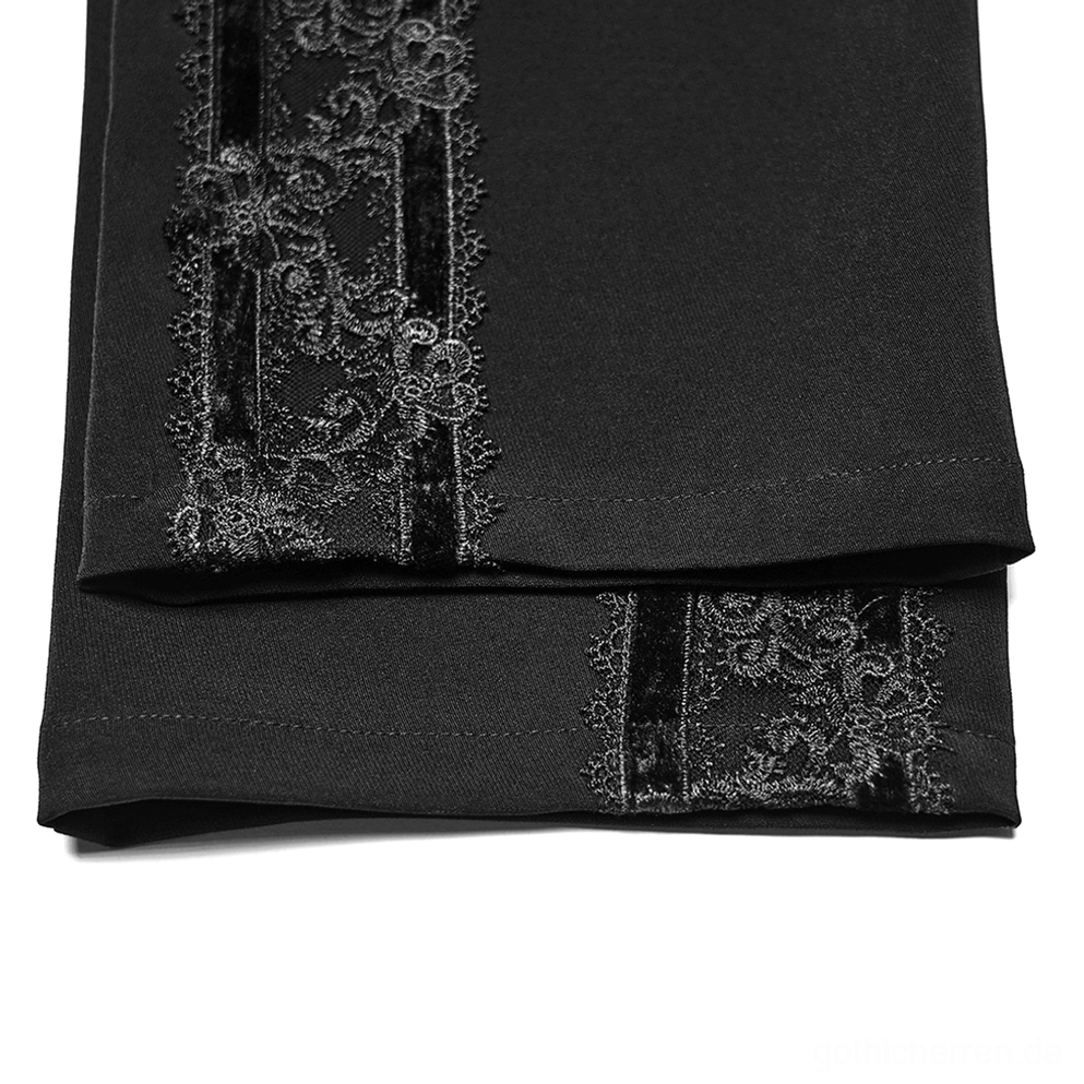 Detailansicht der Seitennah der gotischen Röhrenhose - ornamentale bestickte Spitze mit Samtrücken und präzise vertikale Panelintegration