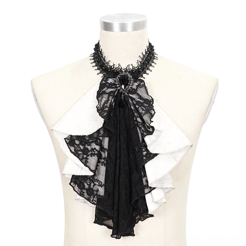 Gothic-Ascot-Halskrawatte mit schwarzer Spitze und weißen Rüschen auf Schneiderpuppe, Nahaufnahme zeigt schwarze Spitzenüberlagerung, mehrschichtige weiße Rüschen und zentrales schwarzes Edelstein-Ornament