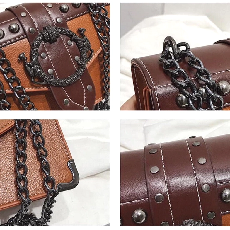 Gothic Schultertasche Metallkette Befestigung und Hardware-Nahaufnahme: robuste schwarze Kettenanbringung, verstärkte Befestigungspunkte, Schädel-Nieten-Akzent und handwerkliche Verarbeitung der Metallelemente