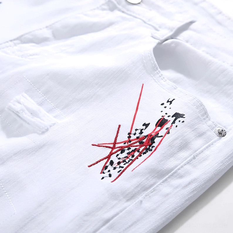 Gothic-Slim-Jeans Oberschenkel und Bein-Zerstörungs-Muster-Details, zeigt strategisch platzierte Risse und zerrissene Löcher mit absichtlichem dekonstruiertem Design