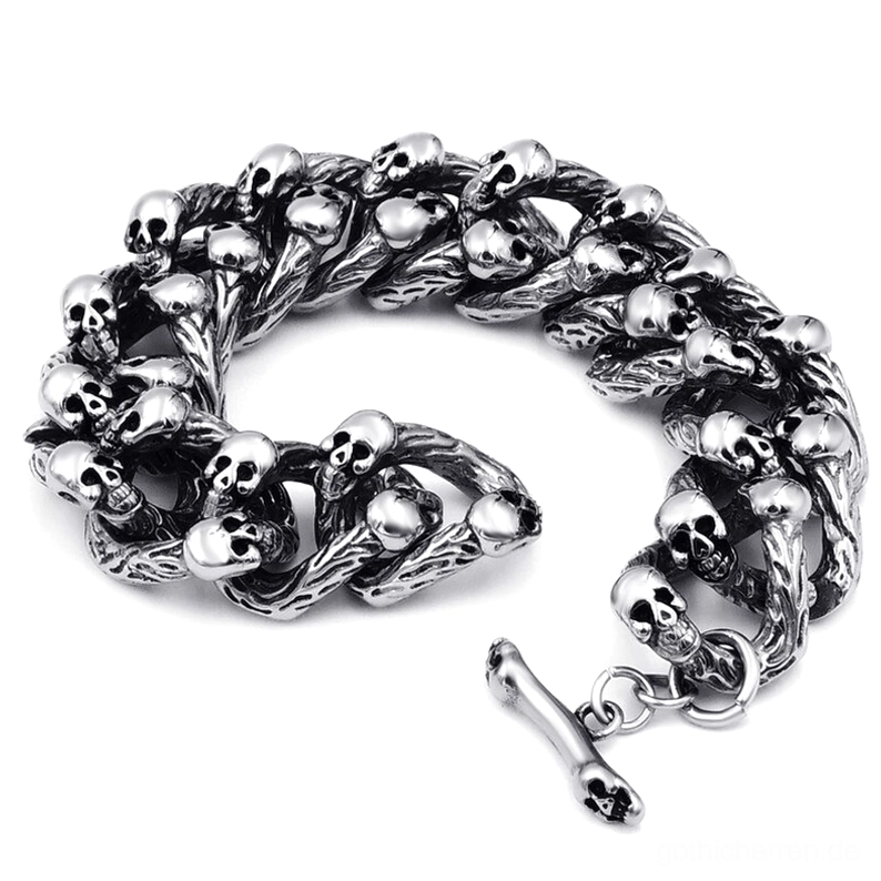 Schweres gotisches Totenkopf-Kettenarmband mit Knochen-Toggle-Verschluss Detail robuste Verarbeitung verdrehter Glieder vollständig integrierte Totenkopf-Akzente antiker Silberton
