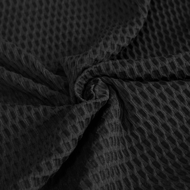 Stofftextur-Nahaufnahme schwarzes Honeycomb-Mesh-Gewebe zeigt dehnbares Polyamid-Konstruktion gotisches Sweatshirt