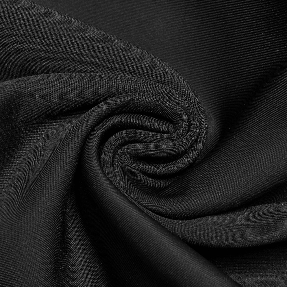 Komplette Seitenprofilansicht schwarze Gothic Flammen Nieten-Hose zeigt schlanke Silhouette und eleganter Stoff-Fall der Röhrenhose