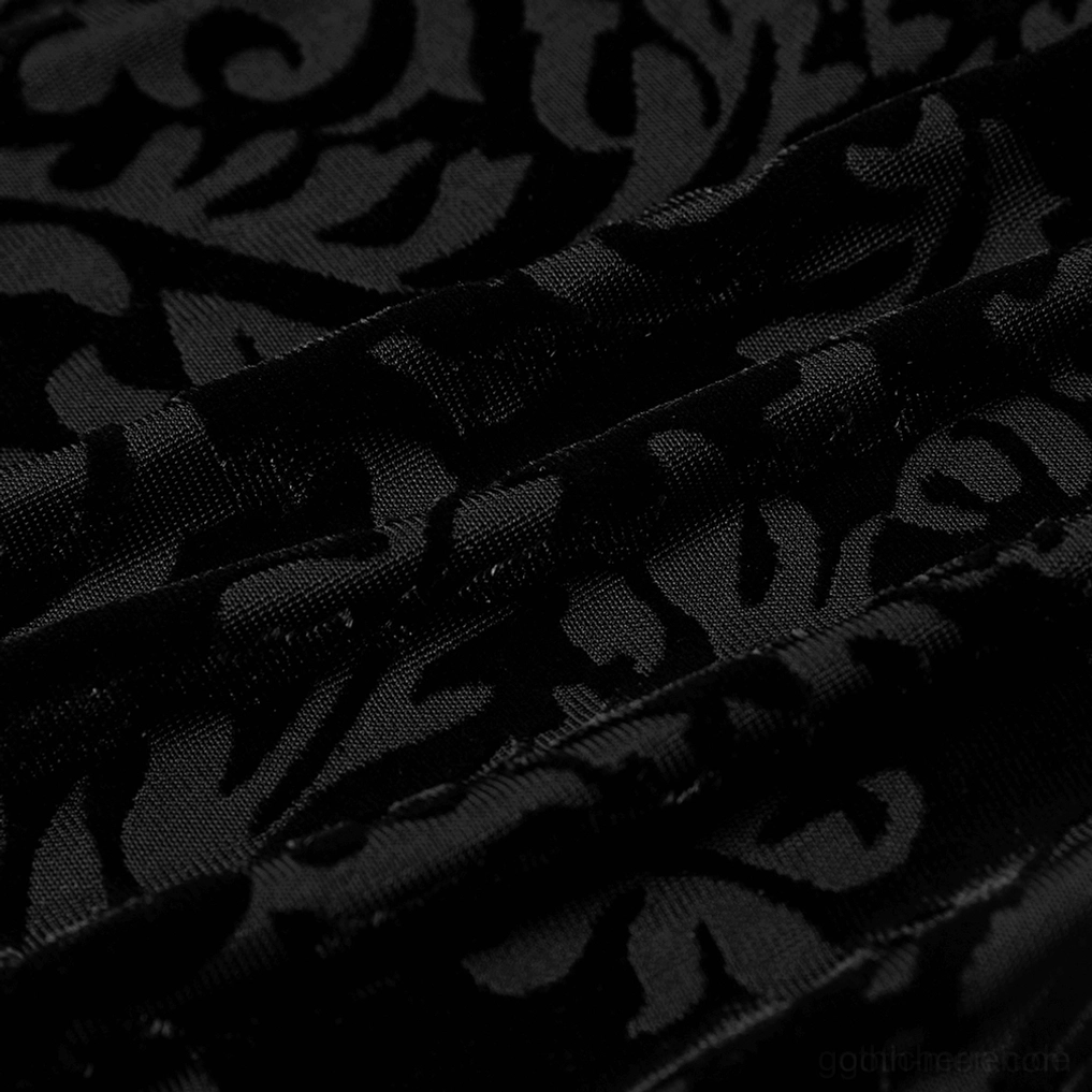 Extreme Nahaufnahme laser-graviertes schwarzes Damast-Blütenmuster auf Samtgewebe, verschlungene botanische Motive, weiches Flor-Finish