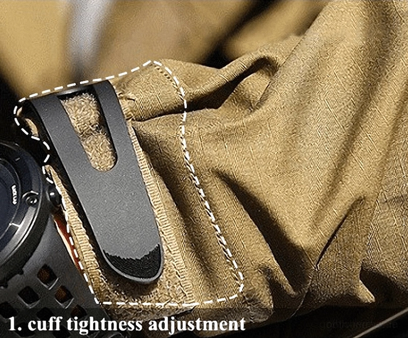 Manschetten-Verstellriemen mit Klettverschluss Befestigung auf taktischer Jacke zeigt Straffung Kontroll Detail und professionelle Näharbeit
