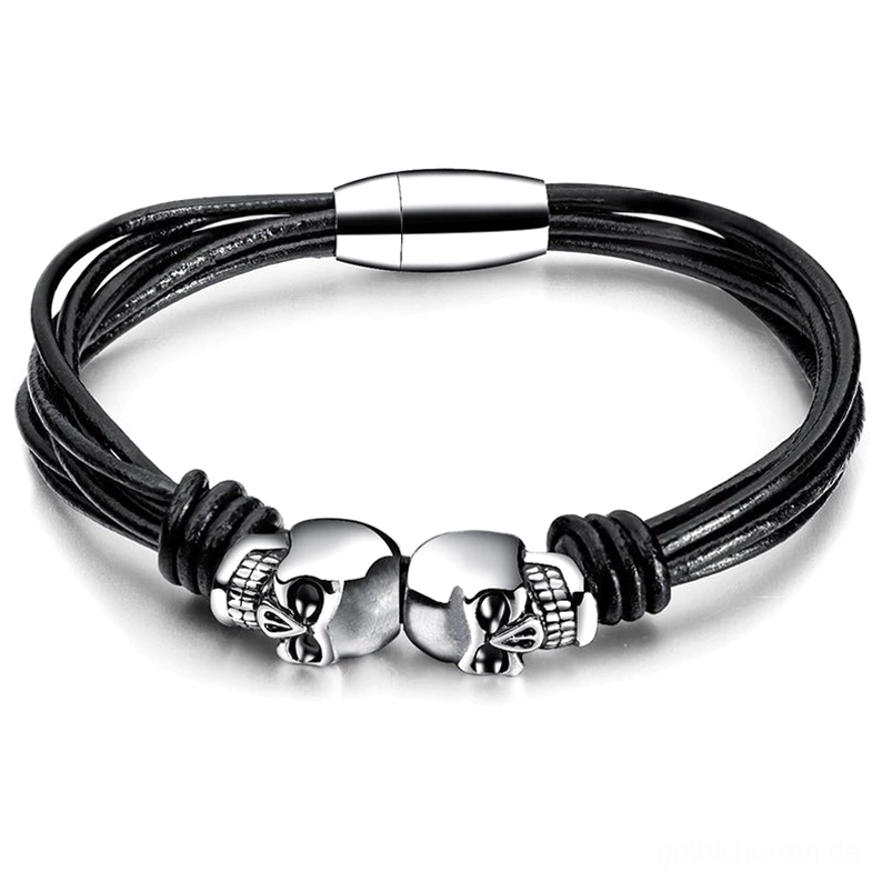 Memento-Mori Doppelschädel Edelstahl Gothic Armband Flachlage auf weißem Hintergrund, zeigt intrikate Seilkette und silberne Schädel-Anhänger für Herren