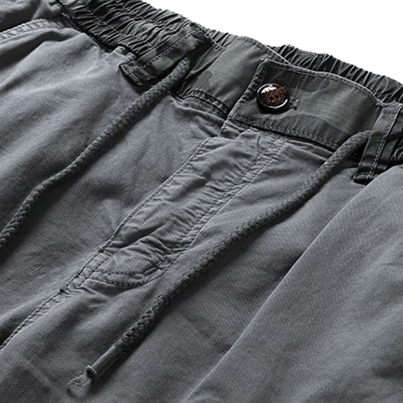 Nahaufnahme Taillenschluss Gothic Cargo Joggers elastischer Bund Kordelzug Knopfverschluss