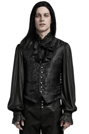 Schwarze Blüten-Jacquard Gothic Weste Vorderansicht auf Model mit gerüschtem Dichterhemd, zeigt schlanke Silhouette und Metallknopf-Plakette