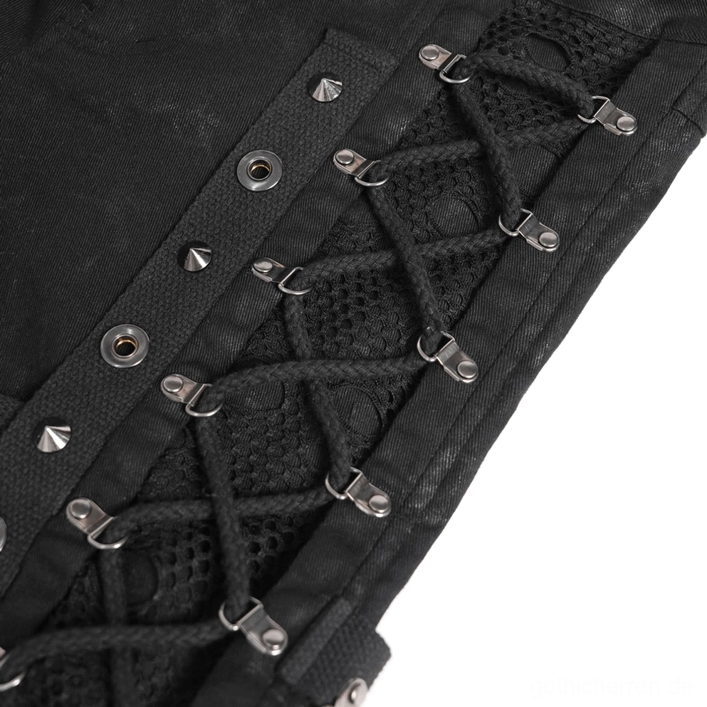 Extreme Nahaufnahme schwarze Gothic Hose Metallösen Schnürlace-Straps mit Pyramidennieten-Makrodetails