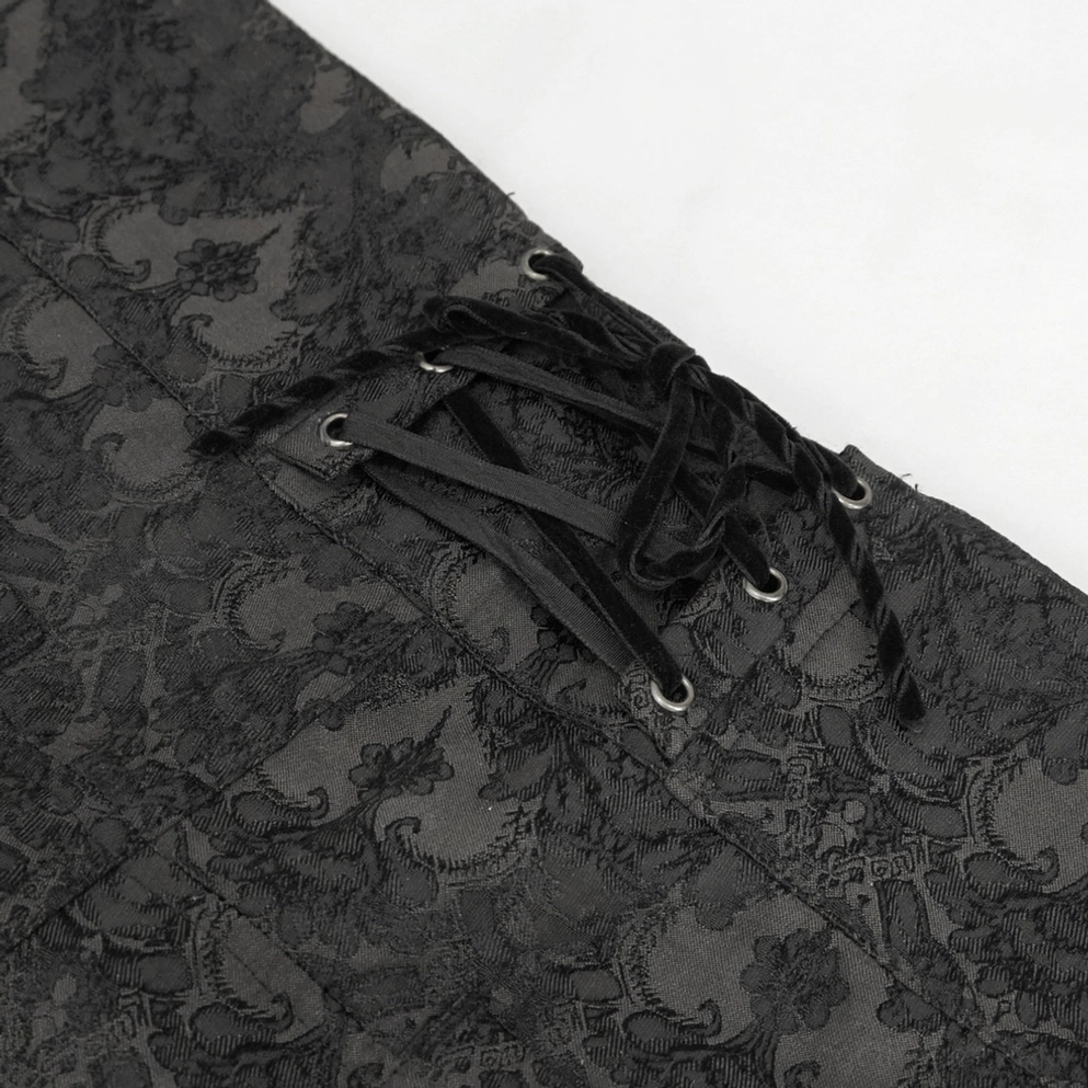 Schwarze Damast-Steampunk Röhrenhose mit detaillierter Nahaufnahme des Jacquard-Webmusters, feine Verarbeitung des barocken Damast-Designs und hochwertige Materialqualität sichtbar