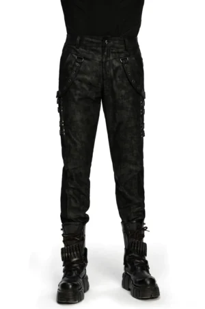 Schwarze distressed Gothic Slim-Fit Röhrenhose vorne mit Metall-Ösen-Straps auf männlichem Model in Frontwinkelansicht