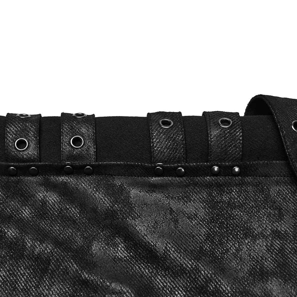 Schwarze distressed Gothic Slim-Fit Röhrenhose Metall-Ösen und Nieten-Akzent Nahaufnahme auf Twill-Stoff