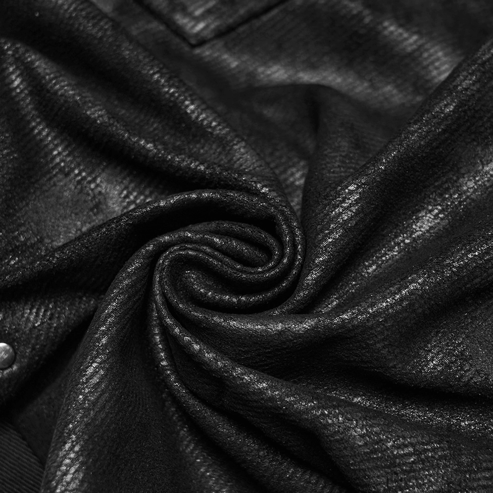 Schwarze distressed Gothic Slim-Fit Röhrenhose Stoff-Textur Nahaufnahme zeigt geflammte Druckoberfläche und absichtliche Farbverschönerung