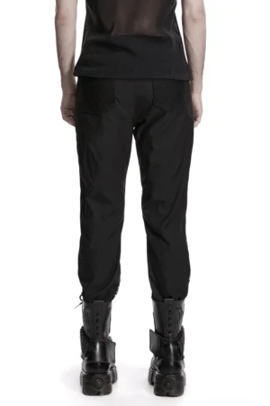 Schwarze Gothic Slim-Fit Mesh Röhrenhose mit doppellagigen Frontpanels und Oberschenkel-Schnallen in vollständiger Hinteransicht auf Model