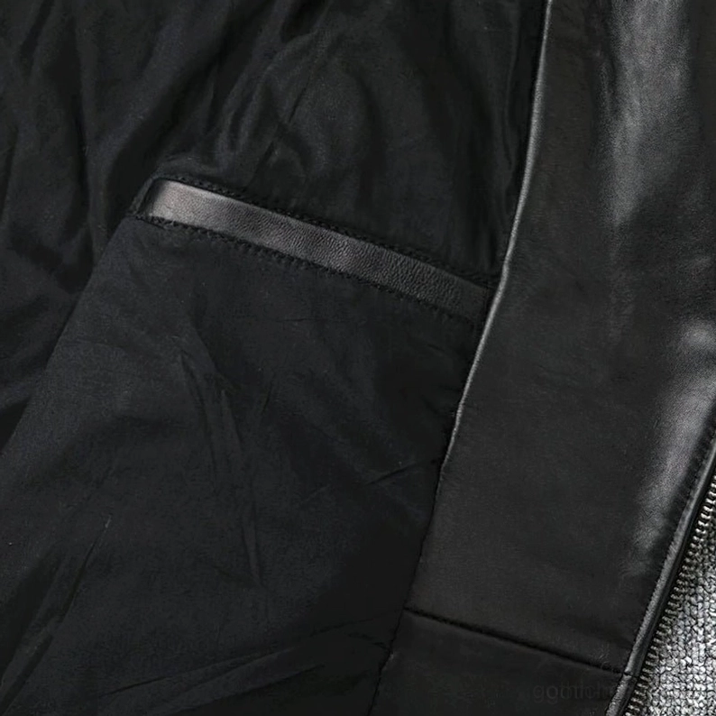 Schwarze Lederbikerjacke Ärmellänge Passform Demonstriert konische Manschette Armdetail
