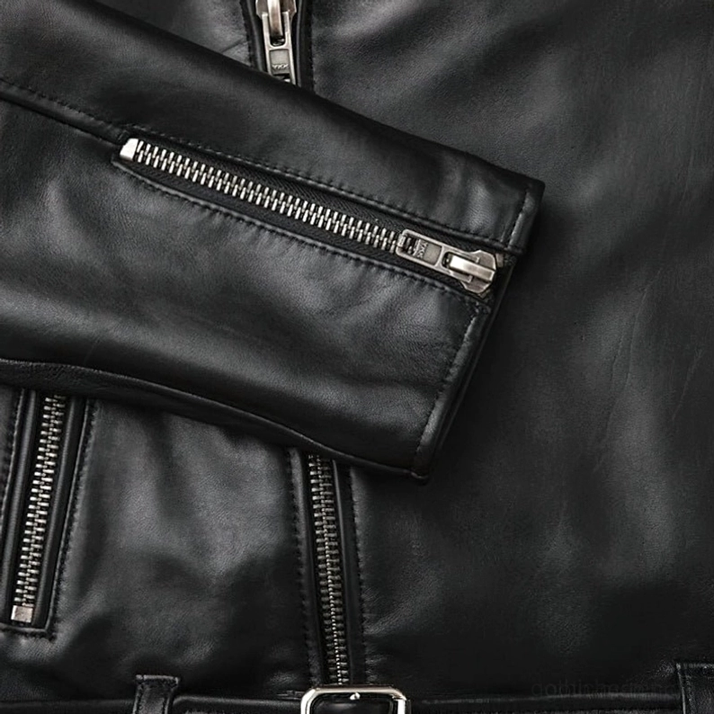 Schwarze Lederbikerjacke Materialtextur Kornmuster authentisches echtes Leder natürliche Oberflächenstruktur