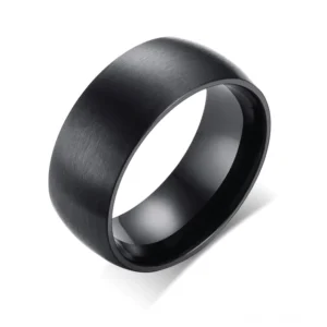 Schwarzer mattierter Edelstahl Gothic Band Ring 8mm Breite Draufsicht-Overhead-Ansicht weißer Hintergrund minimalistisches Industrial-Design