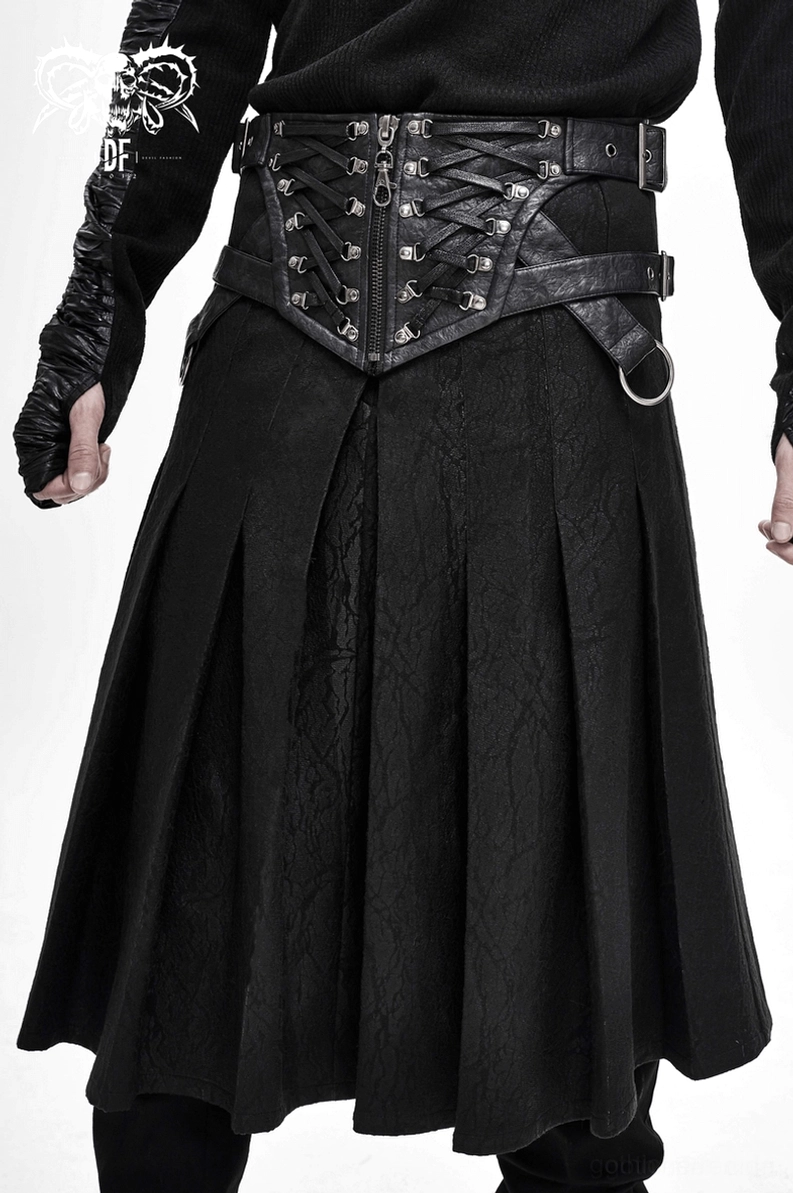 Asymmetrischer schwarzer Herrenrock mit Harness-Layering und Festival-Fashion-Accessoires für Dark-Alternative-Styling