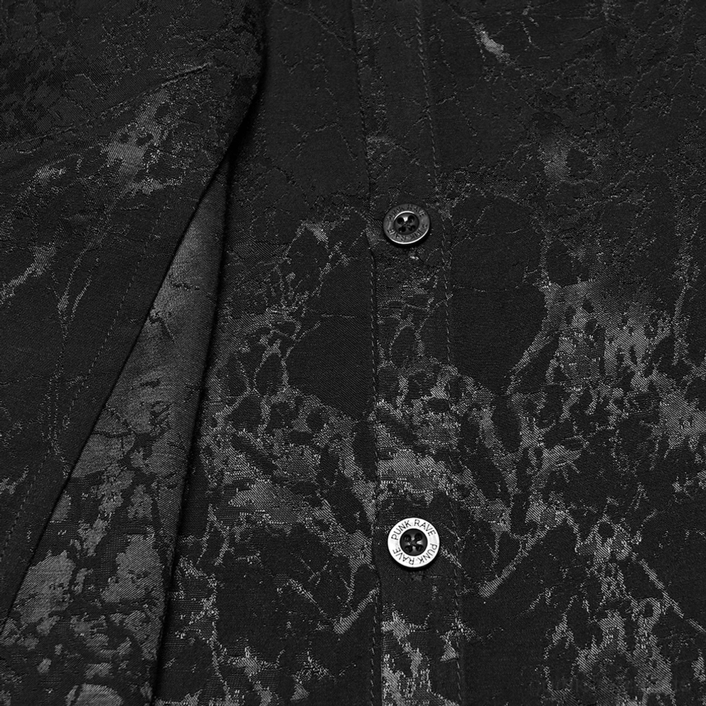Schwarzes Gothic Hemd Frontblende und Stoff Detail Nahaufnahme, unregelmäßige asymmetrische Knopfleiste mit Metallknöpfen, Jacquard-Weben Strukturdetail, gemottelte Textur, architektonisches Design-Element