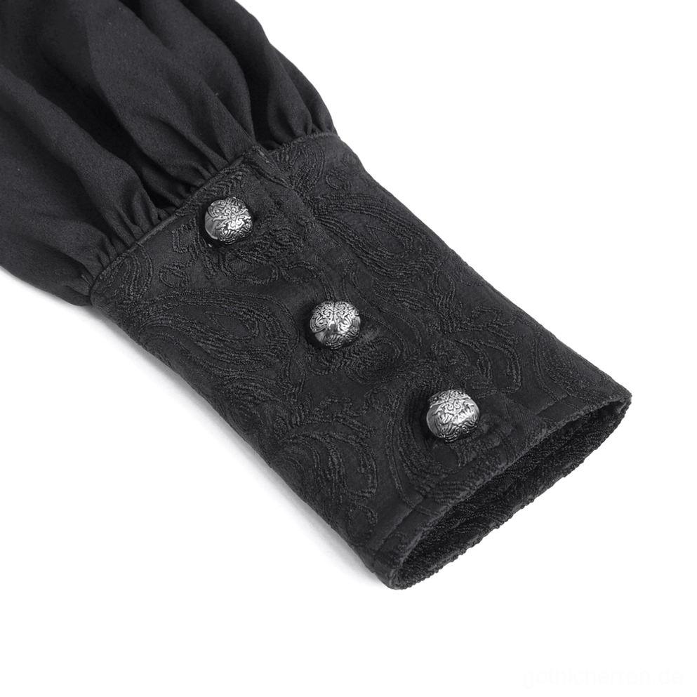 Nahaufnahme schwarzes gotisches Bistumshemd Manschette mit drei Metalldekorationsknöpfen, gerafftem Puff-Ärmel und Paisley-Jacquard-Gewebe