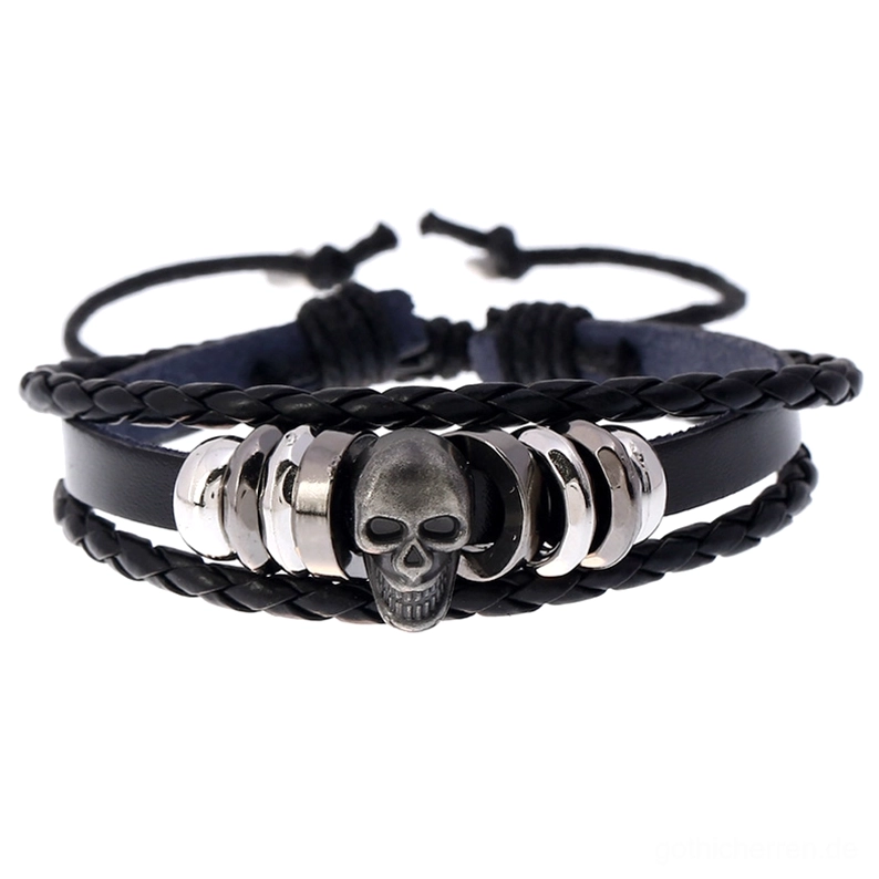Schwarzes Leder Gothic Schädel Armband in Flachlage mit versilbertem Schädel-Charm und handgewebtem geflochtenem Lederdesign auf weißem Hintergrund – Gothic Armband Unisex