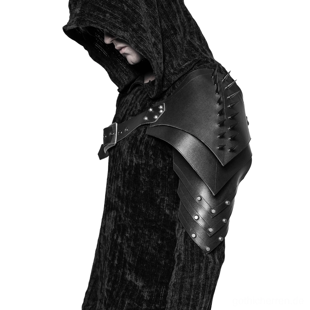 Schwarzes Spike Schulter-Harness in Seitenprofilansicht auf Model, zeigt geschichtete Rüstungsplättchen, Metallnieten und detaillierte Lederkonstruktion