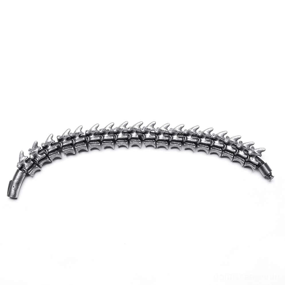 Seitenprofilansicht der Vertebra Spike Metall-Armmanschette mit gekrümmter Wirbelsäulen-Designform und dunkelsilberner Oberflächenfinish