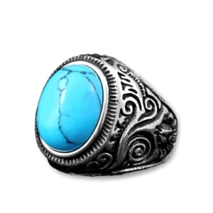 Vintage-Silber-Gothic-Siegelring mit Türkis-Edelstein, Bezel-Fassung mit eingraviert geschnitzten Scroll-Mustern, flache Draufsicht-Produktfotografie